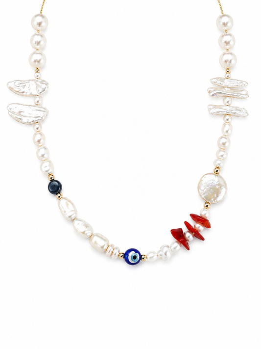 Necklace with pearls, red fish-shaped beads, and a blue evil eye bead on a white background